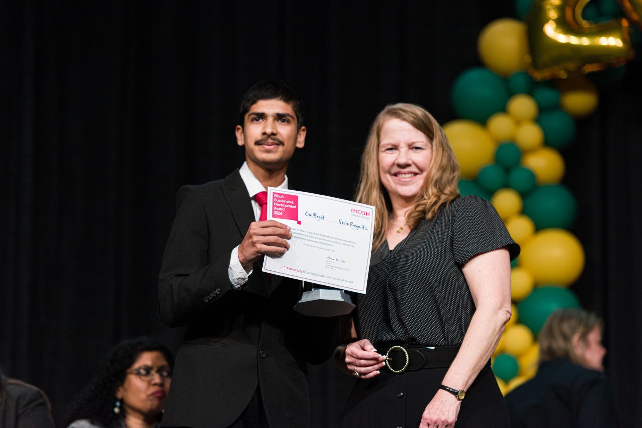 Receiving the RICOH Sustainable Development Award